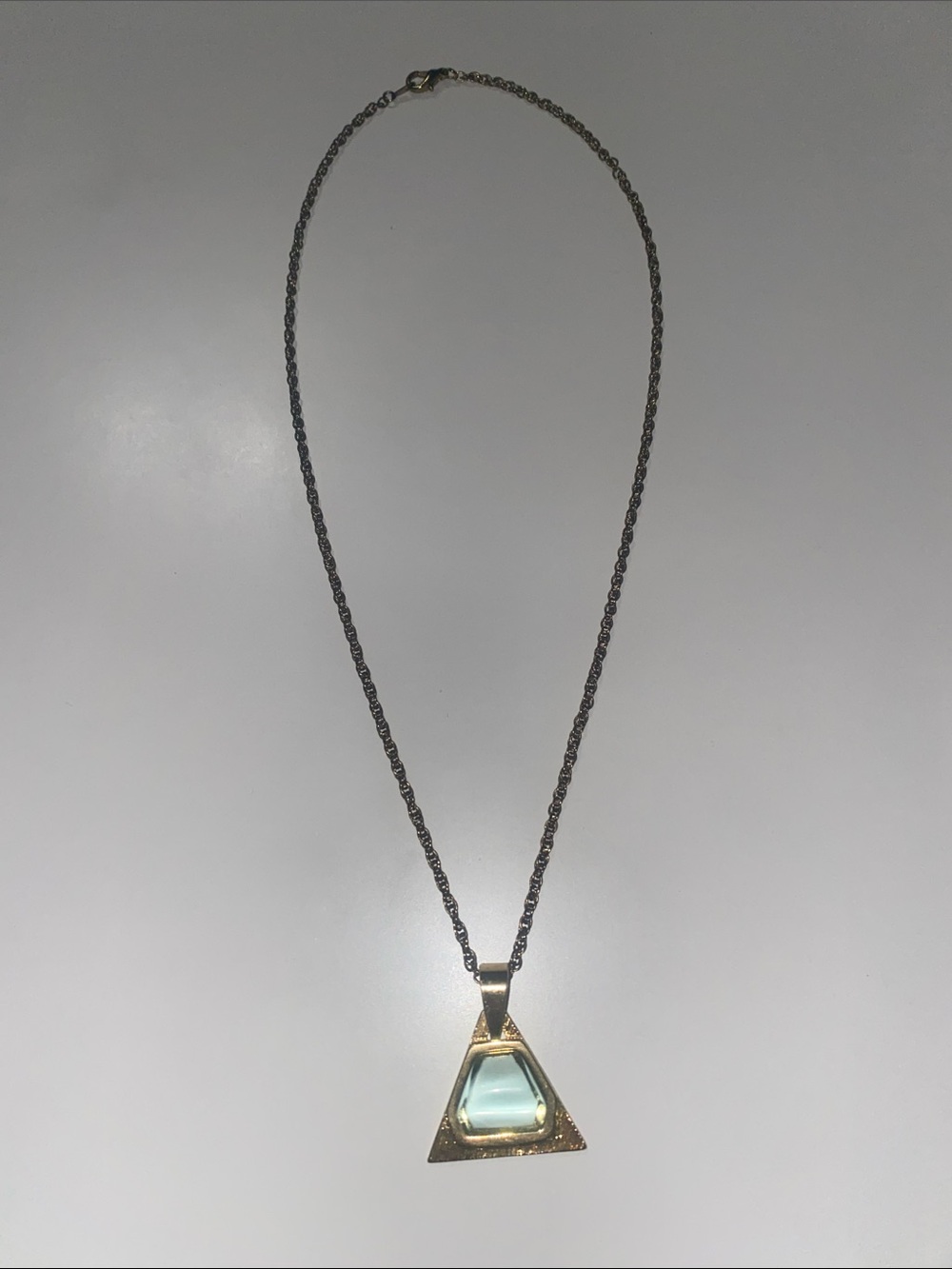 Gold Triangle Pendant Necklace with Pale Blue Gemstone